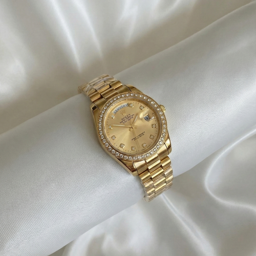 Rolex Day-Date  Gold with Diamond Bezel